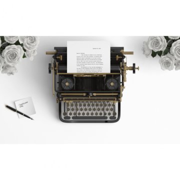 partners/2017/02/partner55433/images/old-typewriter-on-a-desktop-with-white-roses_1104-70.jpg